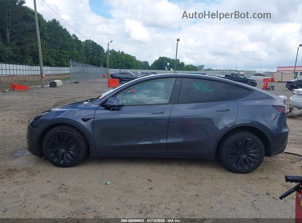 7SAYGDEE7PF707251 2023 TESLA MODEL Y Серый Вид задней части салона