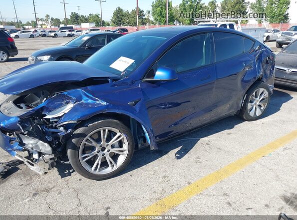 7SAYGDEE7RF007703 2024 TESLA MODEL Y Blue წინა მარცხენა ხედი სამი მეოთხედიდან