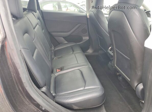 7SAYGDEE7RF036070 2024 TESLA MODEL Gray Vista de los asientos traseros