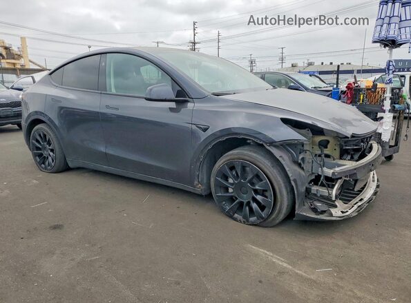 7SAYGDEE7RF036070 2024 TESLA MODEL Gray Delantero derecho