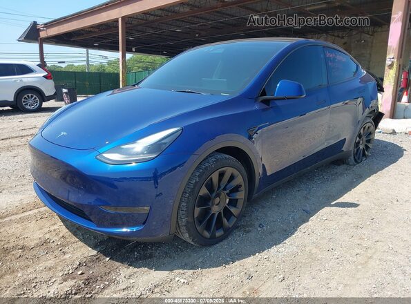 7SAYGDEE7SA364883 2025 TESLA MODEL Y Blue Առջևի ձախ երեք քառորդ տեսարան