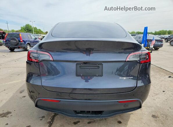 7SAYGDEE7SF258968 2025 TESLA MODEL Charcoal Vista trasera