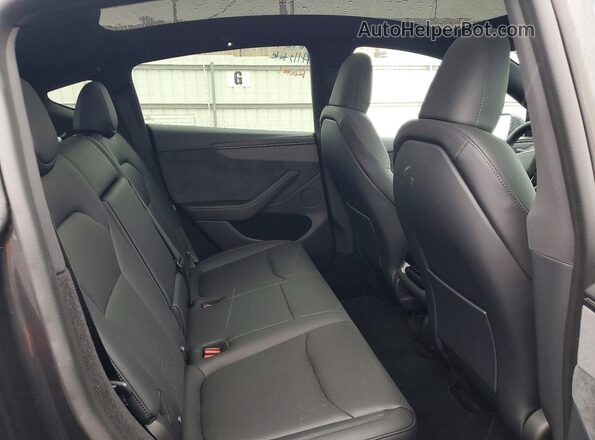 7SAYGDEE7TF579474 2026 TESLA MODEL Charcoal Вид задньої частини салону