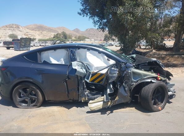 7SAYGDEE7TF624400 2026 TESLA MODEL Y Black Սալոնի հետևի տեսք