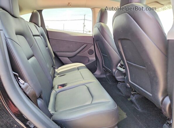 7SAYGDEE8NF511378 2022 TESLA MODEL Black Rear seats view