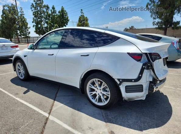 7SAYGDEE8PA125107 2023 TESLA MODEL White Rear left