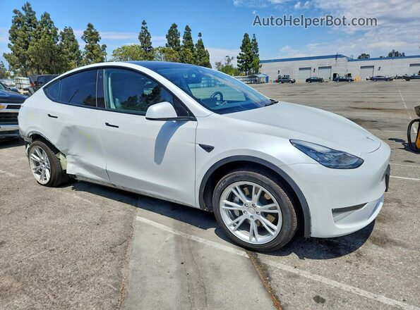 7SAYGDEE8PA125107 2023 TESLA MODEL White Front right