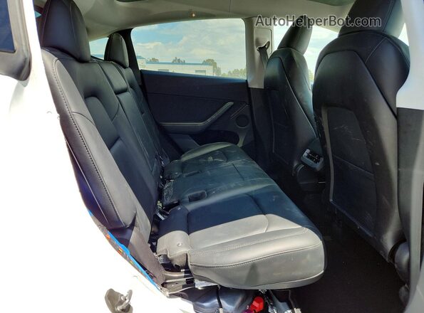 7SAYGDEE8PA125107 2023 TESLA MODEL White Rear seats view