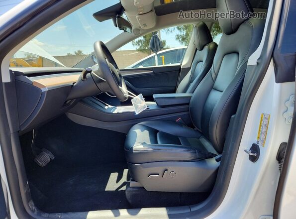 7SAYGDEE8PA125107 2023 TESLA MODEL White Front interior view