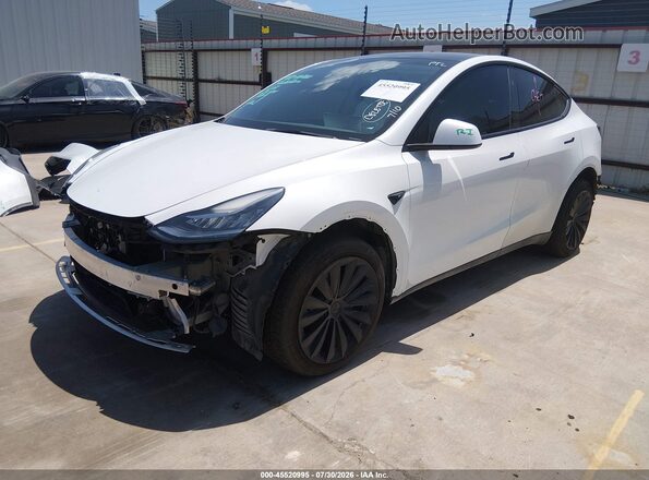 7SAYGDEE8PA147155 2023 TESLA MODEL Y White Առջևի ձախ երեք քառորդ տեսարան
