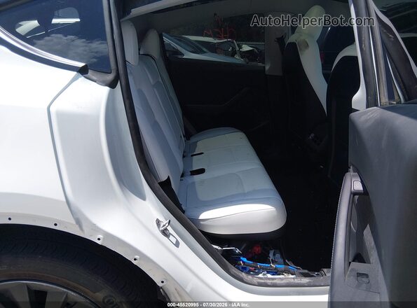 7SAYGDEE8PA147155 2023 TESLA MODEL Y White VIN կոդի պիտակի տեսք