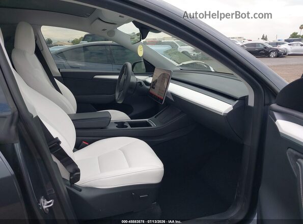 7SAYGDEE8PA200615 2023 TESLA MODEL Y Серый Вид салона спереди