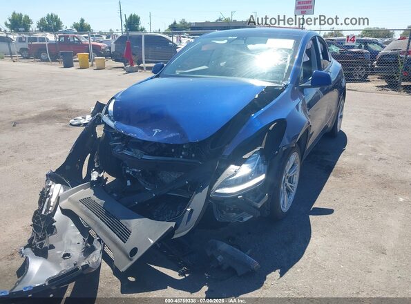 7SAYGDEE8PF582843 2023 TESLA MODEL Y Blue Առջևի ձախ երեք քառորդ տեսարան