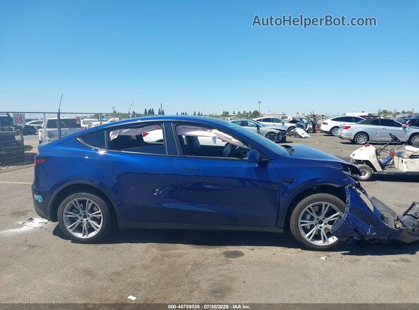7SAYGDEE8PF582843 2023 TESLA MODEL Y Blue Սալոնի հետևի տեսք