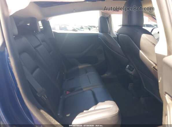 7SAYGDEE8PF582843 2023 TESLA MODEL Y Blue VIN կոդի պիտակի տեսք