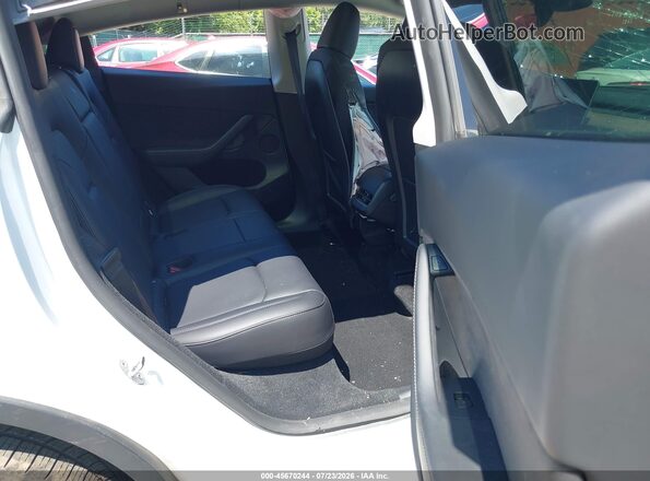7SAYGDEE8PF809819 2023 TESLA MODEL Y White VIN sticker view