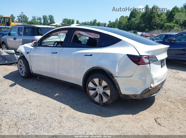 7SAYGDEE8PF809819 2023 TESLA MODEL Y White Rear left