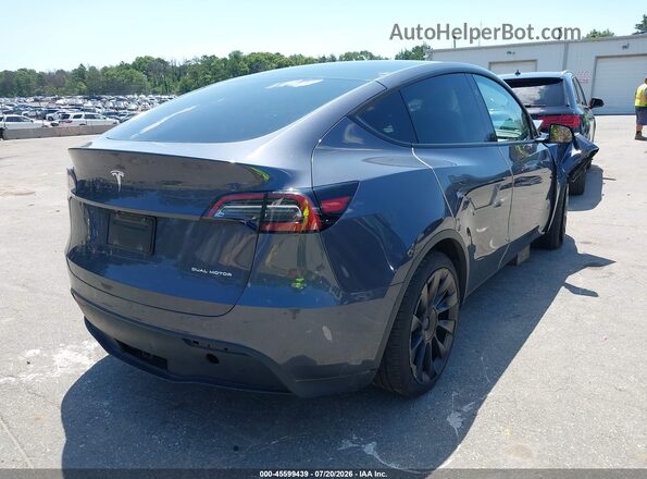 7SAYGDEE8PF861418 2023 TESLA MODEL Y Gray Rear right