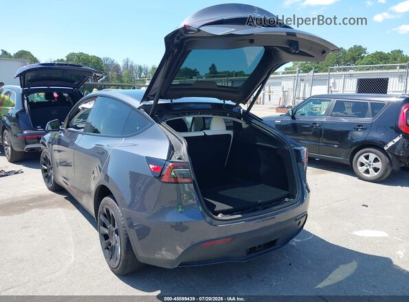 7SAYGDEE8PF861418 2023 TESLA MODEL Y Gray Rear left