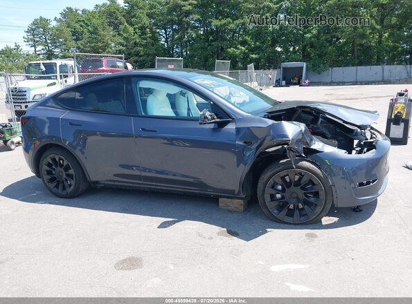 7SAYGDEE8PF861418 2023 TESLA MODEL Y Gray Rear interior view