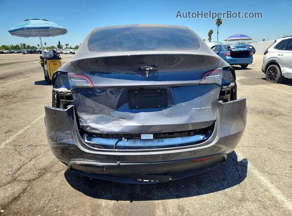 7SAYGDEE8PF918877 2023 TESLA MODEL Gray უკანა ხედი