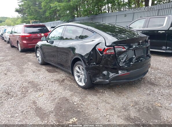 7SAYGDEE8PF978707 2023 TESLA MODEL Y Black Trasero izquierdo
