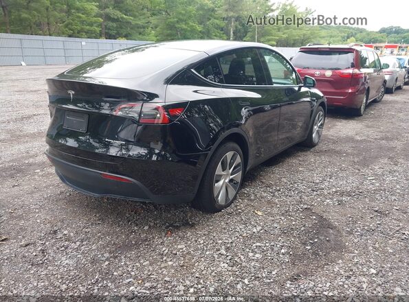 7SAYGDEE8PF978707 2023 TESLA MODEL Y Black Trasero derecho