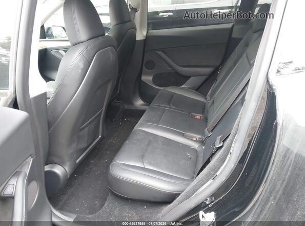 7SAYGDEE8PF978707 2023 TESLA MODEL Y Black Vista de la etiqueta del VIN