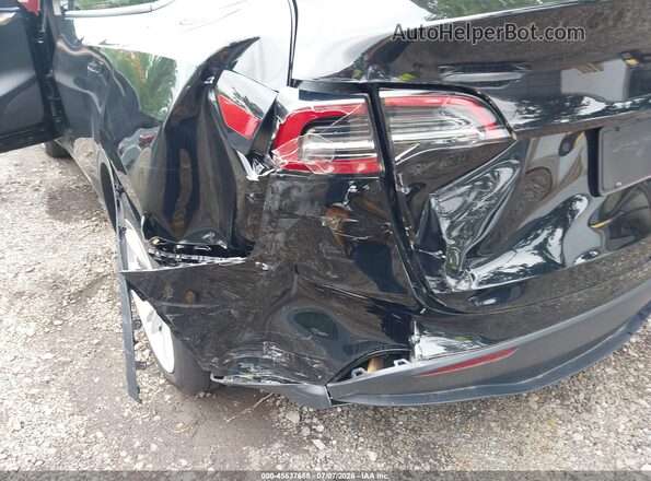 7SAYGDEE8PF978707 2023 TESLA MODEL Y Black Vista frontal