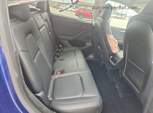 7SAYGDEE8RF201611 2024 TESLA MODEL Blue Vista de los asientos traseros