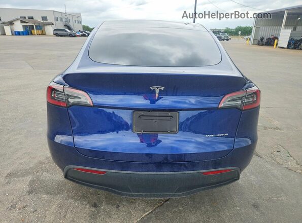 7SAYGDEE8RF201611 2024 TESLA MODEL Blue Vista trasera