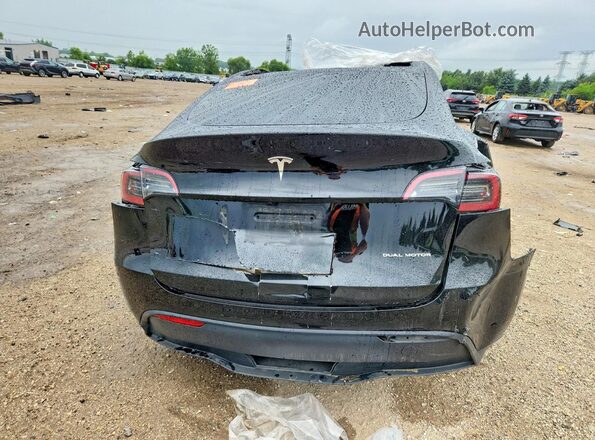 7SAYGDEE8SF258297 2025 TESLA MODEL Black Widok z tyłu