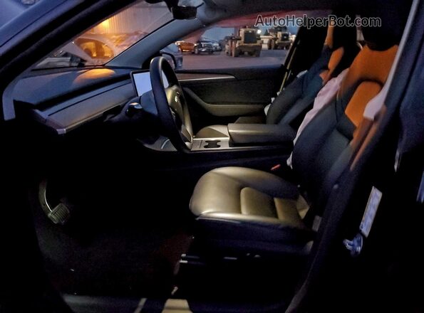 7SAYGDEE8SF299108 2025 TESLA MODEL Charcoal Vista interior delantera