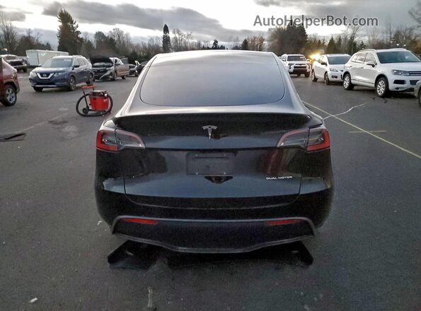 7SAYGDEE8SF299108 2025 TESLA MODEL Charcoal Vista trasera