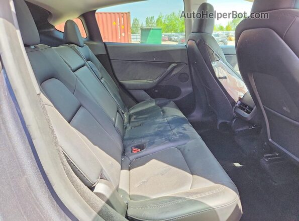 7SAYGDEE9PF775471 2023 TESLA OTHER Gray Вид задньої частини салону