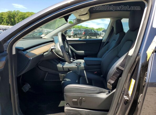 7SAYGDEE9PF836981 2023 TESLA MODEL Gray წინა სალონის ხედი