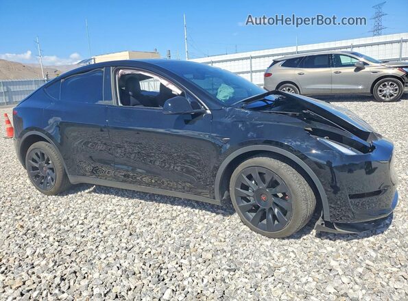 7SAYGDEE9PF858592 2023 TESLA MODEL Black Front right