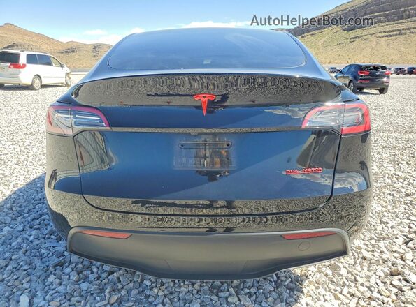 7SAYGDEE9PF858592 2023 TESLA MODEL Black Rear view