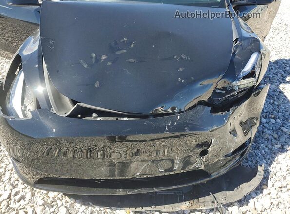 7SAYGDEE9PF858592 2023 TESLA MODEL Black Rear interior view