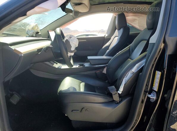 7SAYGDEE9PF858592 2023 TESLA MODEL Black Front interior view