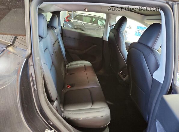 7SAYGDEE9RA238745 2024 TESLA MODEL Gray უკანა სალონის ხედი