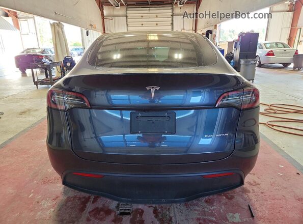 7SAYGDEE9RA238745 2024 TESLA MODEL Gray უკანა ხედი