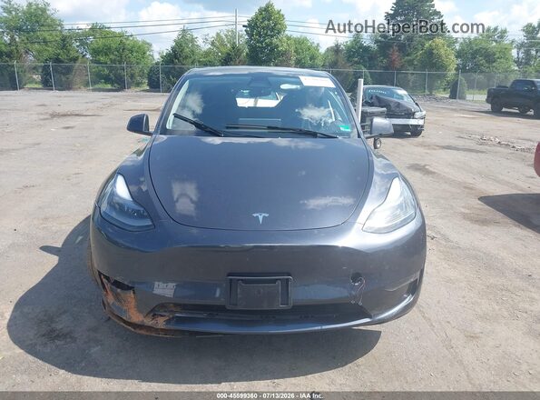 7SAYGDEE9RA304551 2024 TESLA MODEL Y Gray Widok deski rozdzielczej