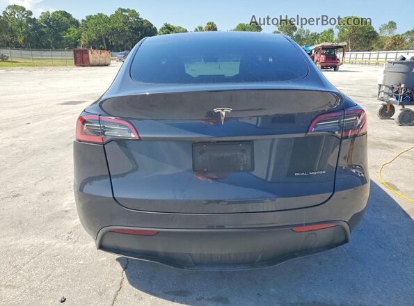 7SAYGDEE9RA317591 2024 TESLA MODEL Gray Rear view