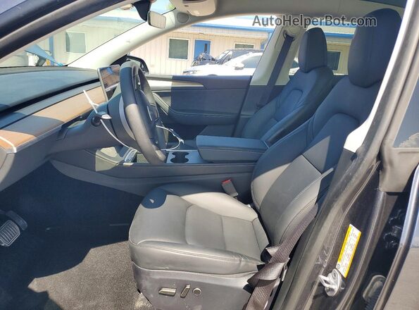 7SAYGDEE9RA317591 2024 TESLA MODEL Gray Front interior view