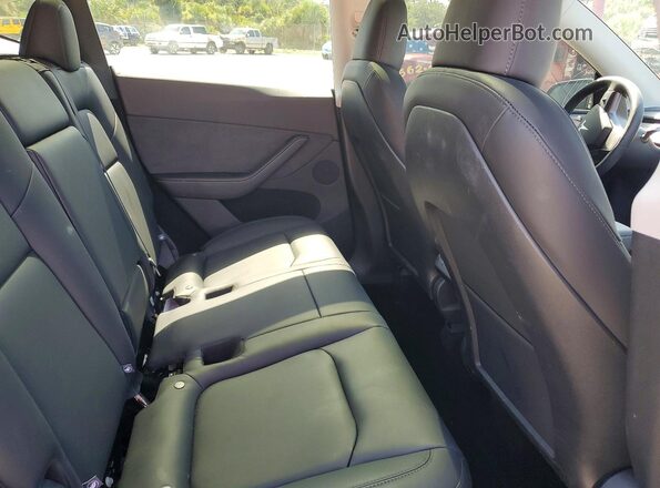7SAYGDEE9RA317591 2024 TESLA MODEL Gray Rear seats view