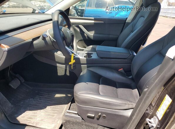 7SAYGDEE9RF081804 2024 TESLA MODEL Gray Вид салону спереду
