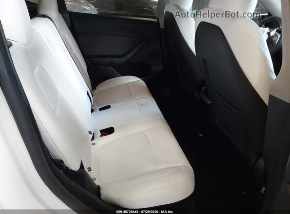 7SAYGDEE9SF302677 2025 TESLA MODEL Y White VIN კოდის სტიკერის ხედი