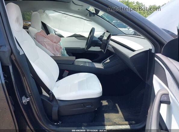 7SAYGDEE9TA454988 2026 TESLA MODEL Y Gray Vista interior delantera