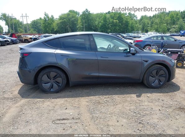 7SAYGDEE9TA454988 2026 TESLA MODEL Y Gray Vista interior trasera